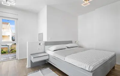 Krevet ili kreveti u jedinici u objektu Apartments Adriatic