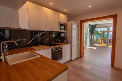 Kuhinja ili čajna kuhinja u objektu Serenum apartments