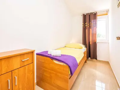 Krevet ili kreveti u jedinici u objektu Holiday Home Marinela - Four Bedroom Holiday Home with Swimming Pool