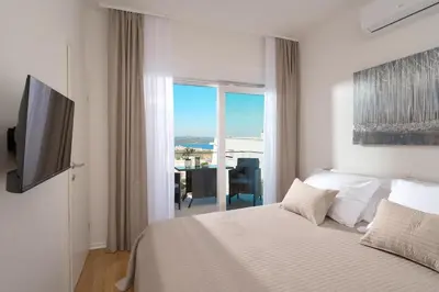 Krevet ili kreveti u jedinici u objektu Hillside Apartments Murter