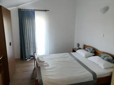 Krevet ili kreveti u jedinici u objektu Apartments Libertas - One Bedroom Apartment with Terrace and Sea View - 10
