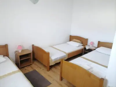 Krevet ili kreveti u jedinici u objektu Apartments Libertas - Two Bedroom Apartment with with Terrace and Sea View 7