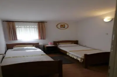 Krevet ili kreveti u jedinici u objektu Apartments Libertas - Two bedroom apartment with Balcony and Sea View - 6