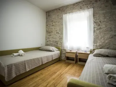 Krevet ili kreveti u jedinici u objektu Apartments Stone House Murter - Two Bedroom Apartment with Balcony