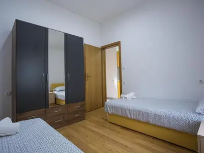 Krevet ili kreveti u jedinici u objektu Apartments Stone House Murter - Two Bedroom Apartment with Terrace