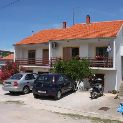 Apartments by the sea Tisno