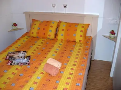Krevet ili kreveti u jedinici u objektu Victoria Mobilehome Jezera Village Holiday Resort