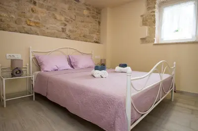 Krevet ili kreveti u jedinici u objektu Villa Ane, Divine holiday