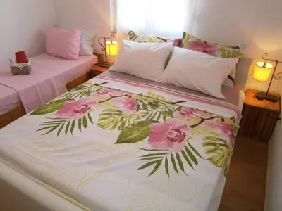 Krevet ili kreveti u jedinici u objektu Beautiful holiday apartment Sanela for relaxed vacation