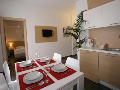 TV i/ili zabavni centar u objektu Apartment in Vodice with balcony, air conditioning, WiFi (4323-1)