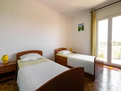 Krevet ili kreveti u jedinici u objektu Simplistic Holiday Home in Rogoznica near the Seabeach
