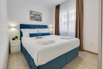 Krevet ili kreveti u jedinici u objektu Apartments Corcovado with Heated Pool