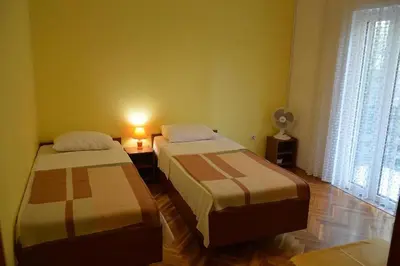 Krevet ili kreveti u jedinici u objektu Apartments and rooms with parking space Vodice - 4164