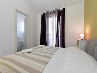 Krevet ili kreveti u jedinici u objektu Apartments Helena